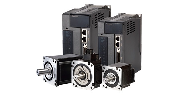 Three compact servo motors with two matching servo drives in the background, suited for automation and motion control systems.
