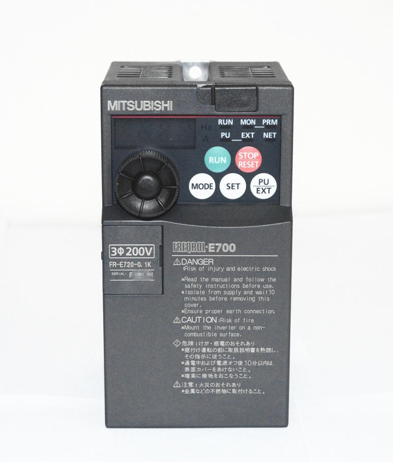 Mitsubishi FR-E700 inverter with control panel, featuring a green RUN button, red STOP/RESET button, and MODE/SET buttons above a small display area.